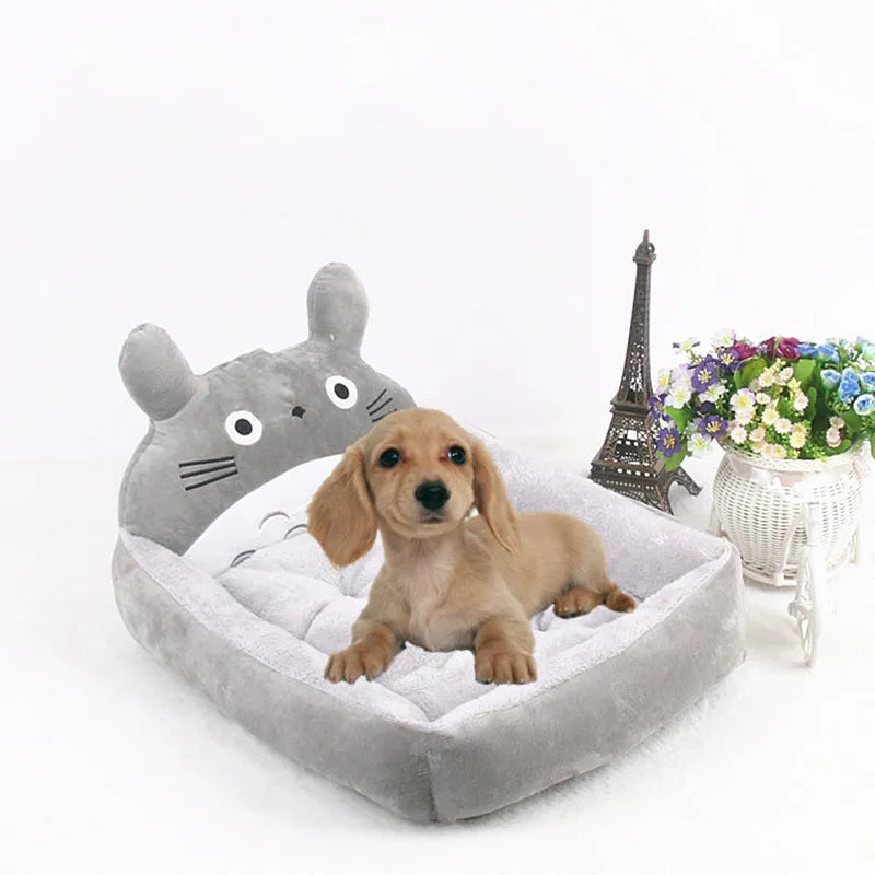 Cartoon-style washable pet bed sofa for a small dog or cat, shown in a choice of colours.