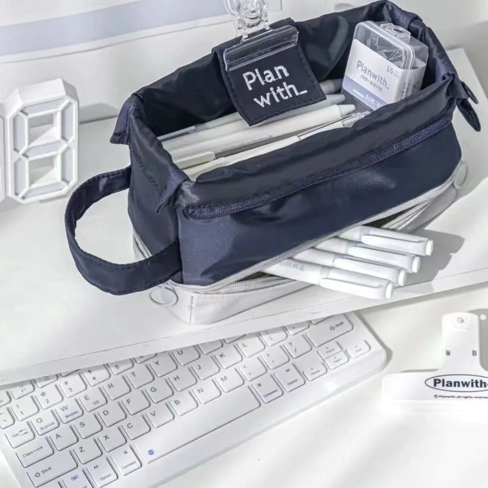 Folding double-layer polyester pencil case in dark blue, blue, and cream white colour options
