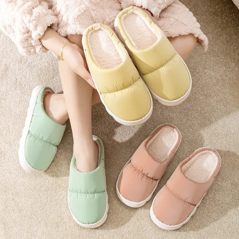 Down cotton indoor slippers with artificial leather upper and rubber sole in various colours
