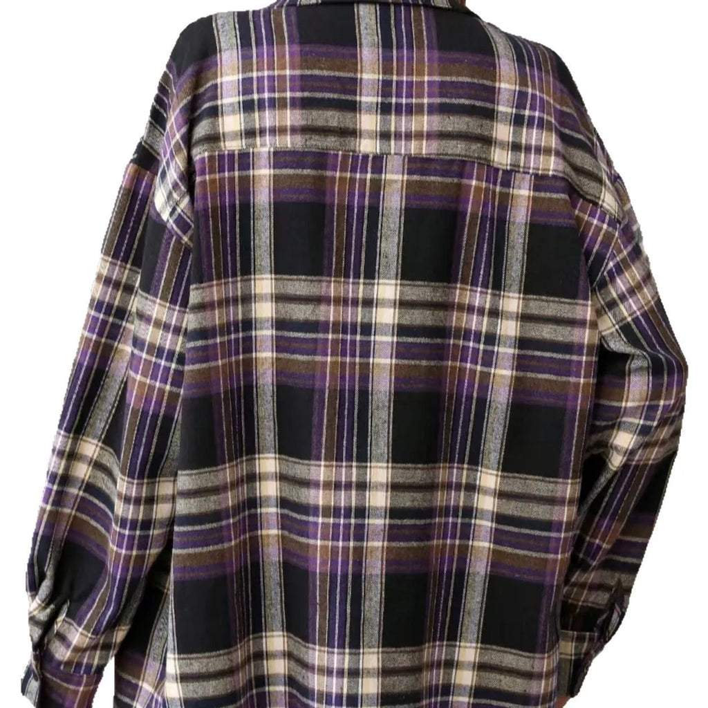 Women's loose fit black plaid long sleeve cotton shirt on a hanger.