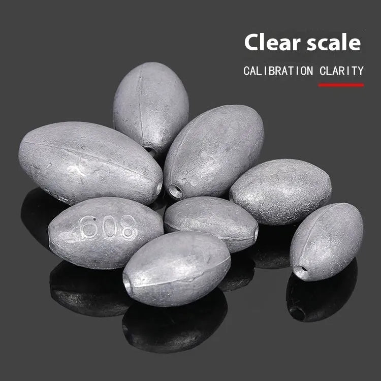 Plastic core olive fishing sinker with rugby shape and scale markings for sea fishing