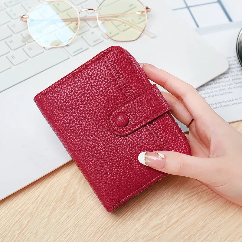 Ladies' short wallet with lychee pattern in 2-fold PU design showing colour options
