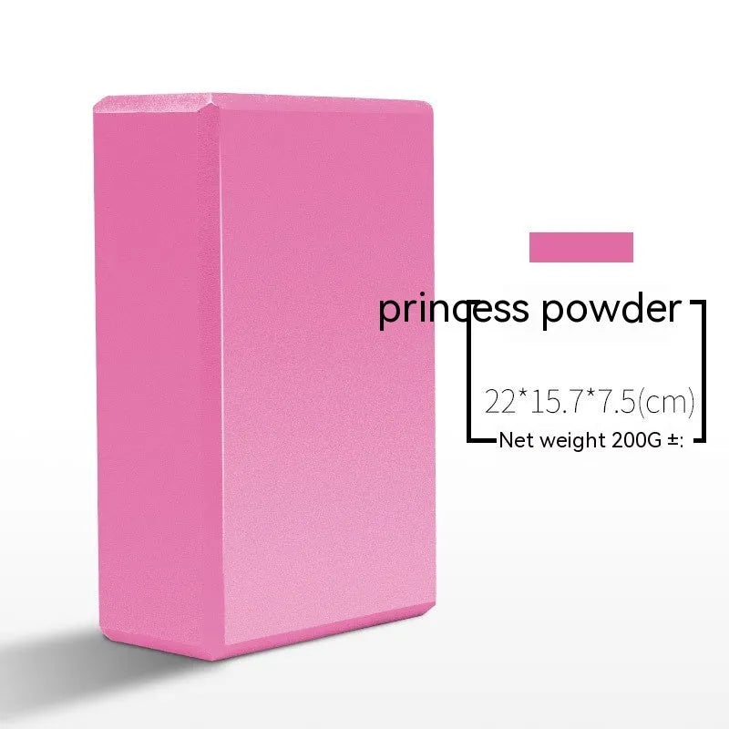 High-density EVA yoga block in violet colour next to a pink block with a cartoon print design.