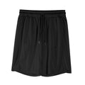 Man wearing black quick-dry mesh fitness shorts with a loose, casual fit and elasticated waistband.
