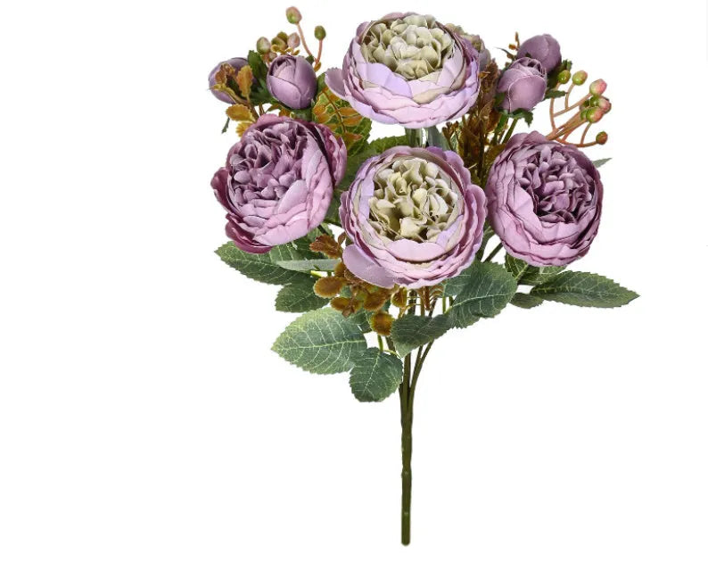 Artificial silk peony flower bouquet in a vase for home or wedding decoration