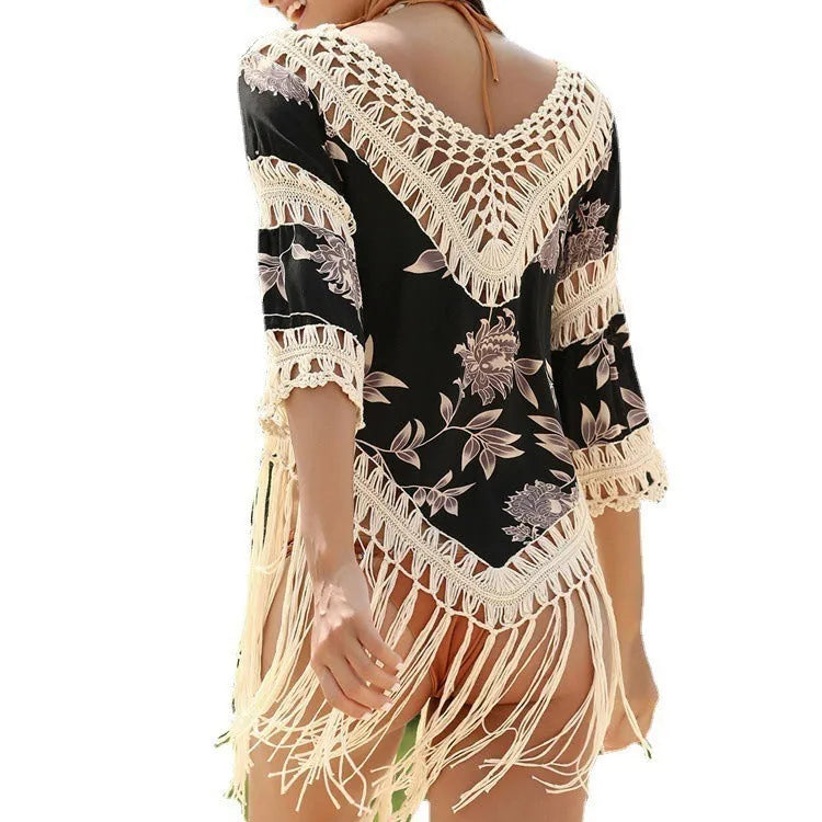 Women's apricot-coloured sun protection blouse with V-neck and long sleeves featuring a hollow-out pattern.