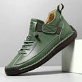 Men's mid-top Martin boot in a solid colour with elastic band and round toe.