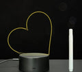 3D acrylic message board lamp with handwritten text glowing in colour, featuring a black touch base and remote control