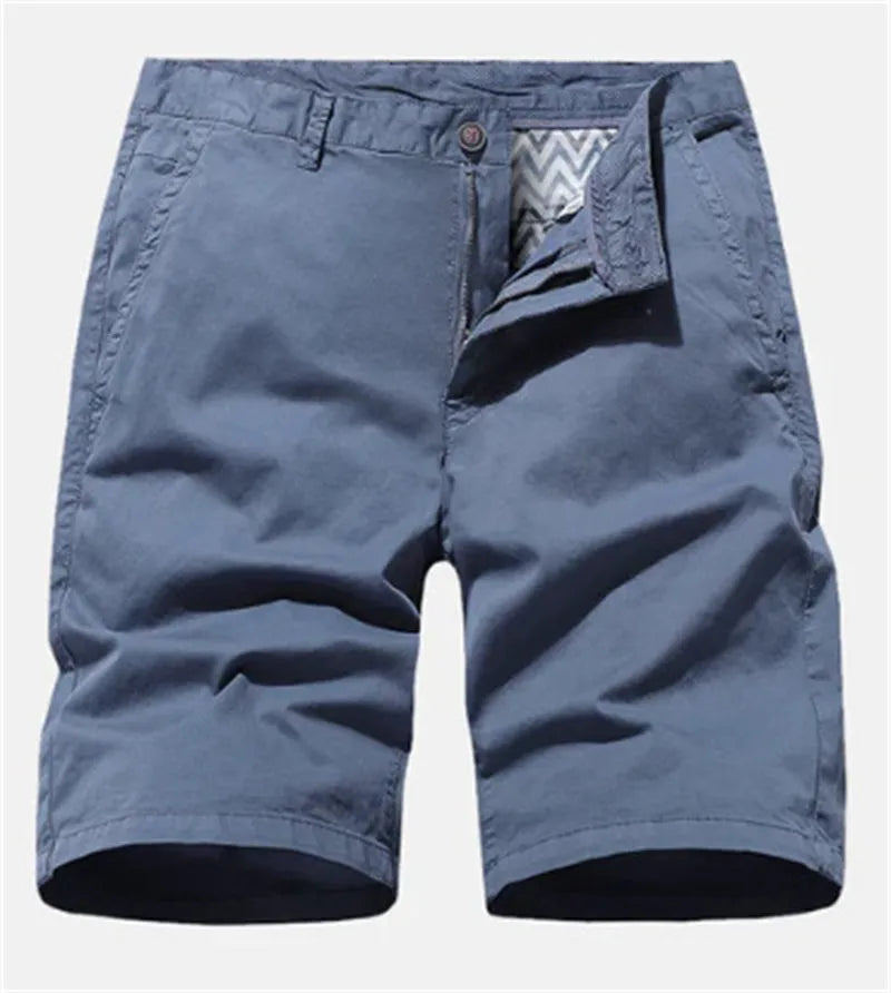 Blue printed denim shorts for men with a loose straight-leg fit and elasticated waistband.
