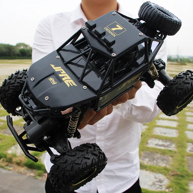Large black 4WD off-road remote control climbing car with 2.4G wireless controller