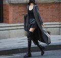 Long gray knitted hooded cardigan trench coat on a model, showing loose fit and 80 cm length.