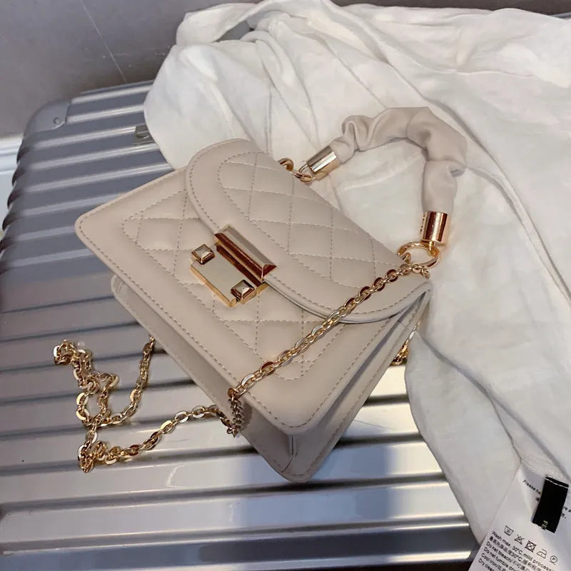Purple rhombus-shaped ladies shoulder bag with chain strap and Korean styling