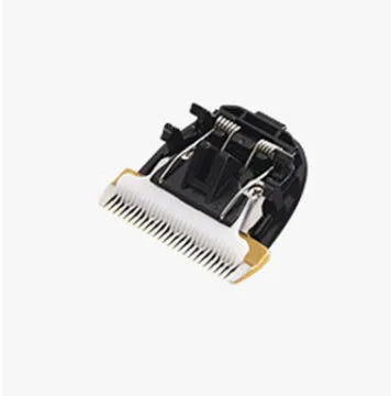 Golden yellow USB rechargeable electric pet clipper set with detachable ceramic blade and limit combs on a white background.