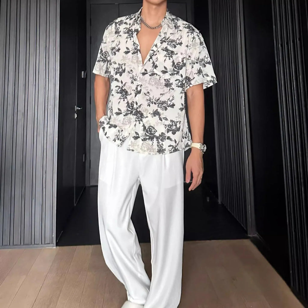 Casual printed shirt with floral pattern and loose fit in black and white colour options