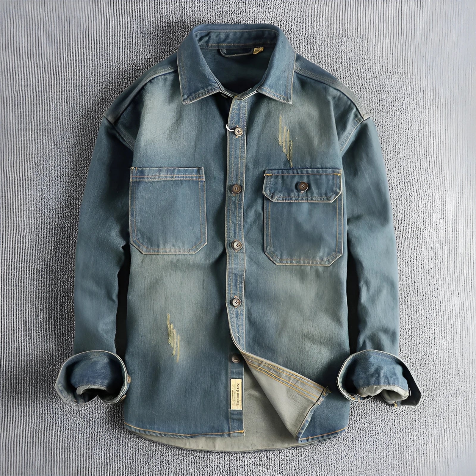 Men's light blue washed vintage denim shirt in loose fit cardigan style with long sleeves