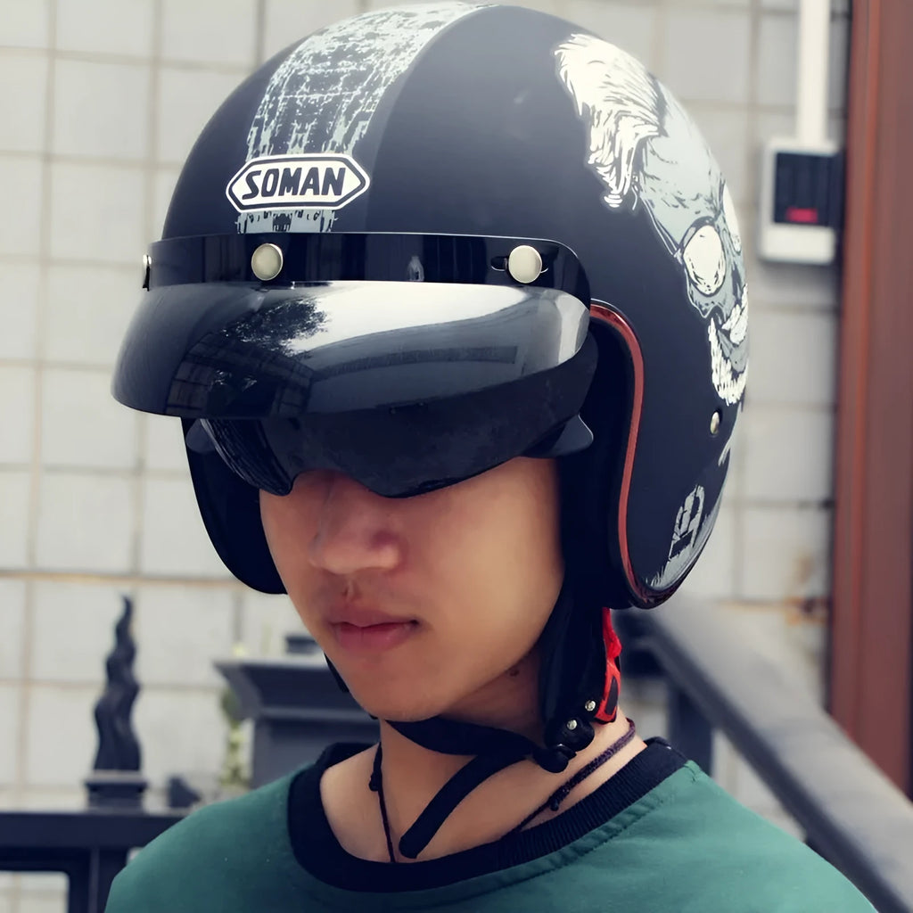 Retro electric bike half helmet in ABS plastic showing colour options including black, grey, orange and yellow designs