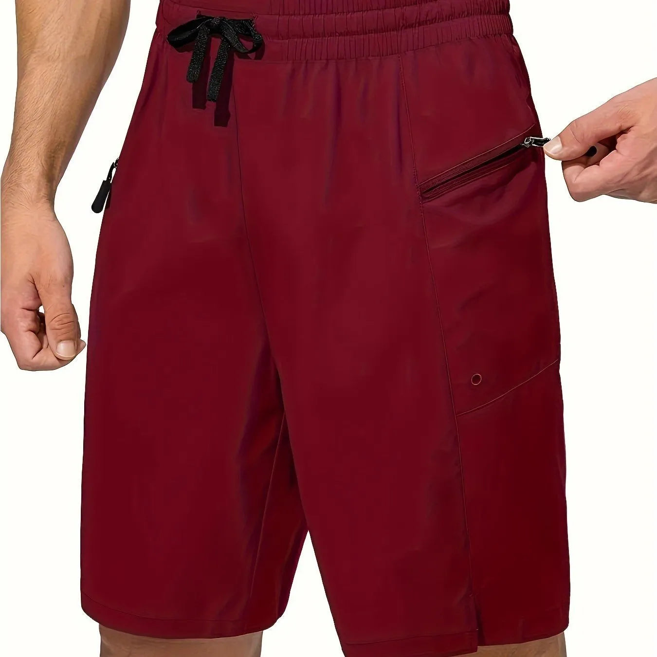 Men's solid colour beach shorts in straight cut with quick-drying polyester fabric