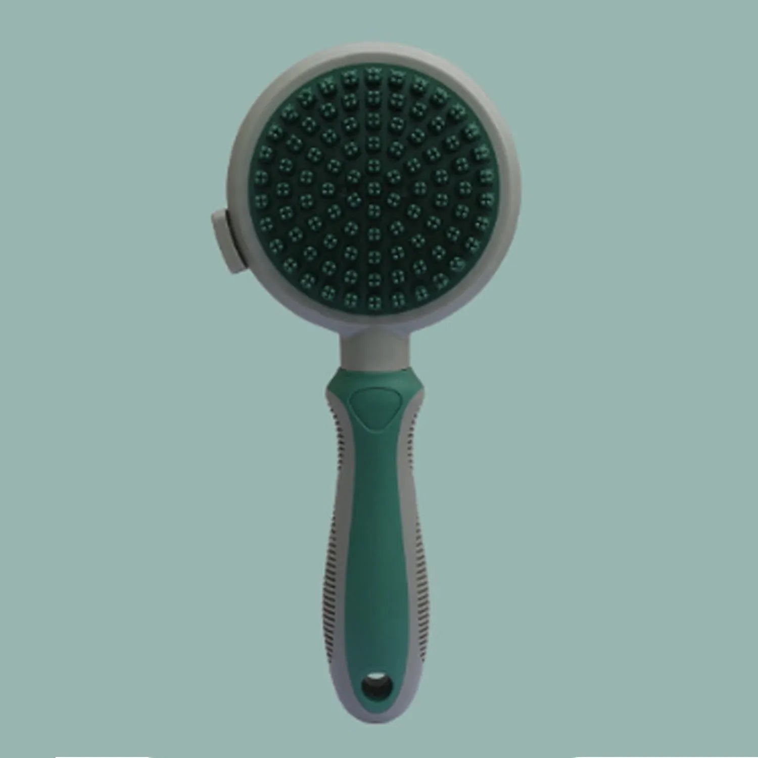 Double-sided cat grooming brush with release button in green and pink colour options