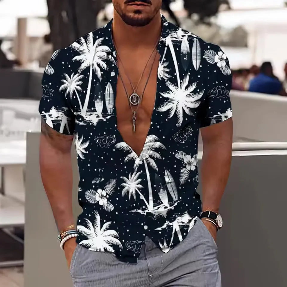 Man wearing a loose-fitting short-sleeve shirt with a colourful floral print pattern.