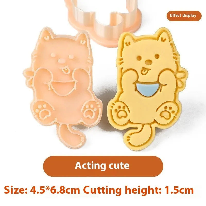 Plastic biscuit mould showing three-dimensional puppy head design with birthday hat for baking
