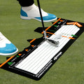 Black neoprene golf swing stance alignment pad with directional markings for training.