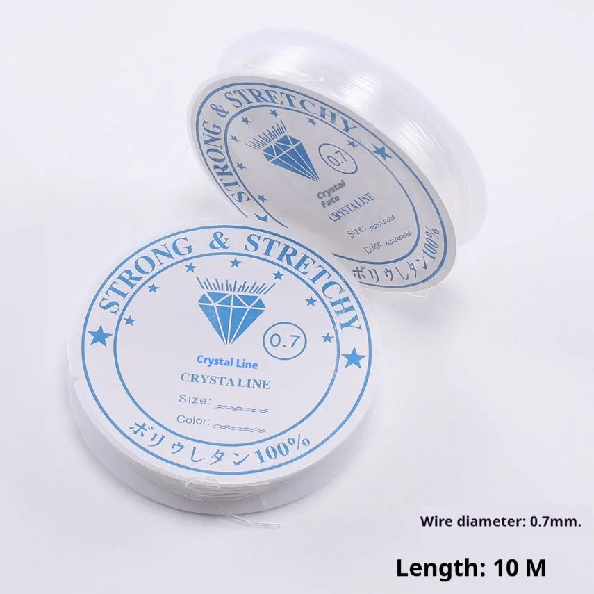 Reel of transparent white elastic fishing line for DIY crafts and jewellery.