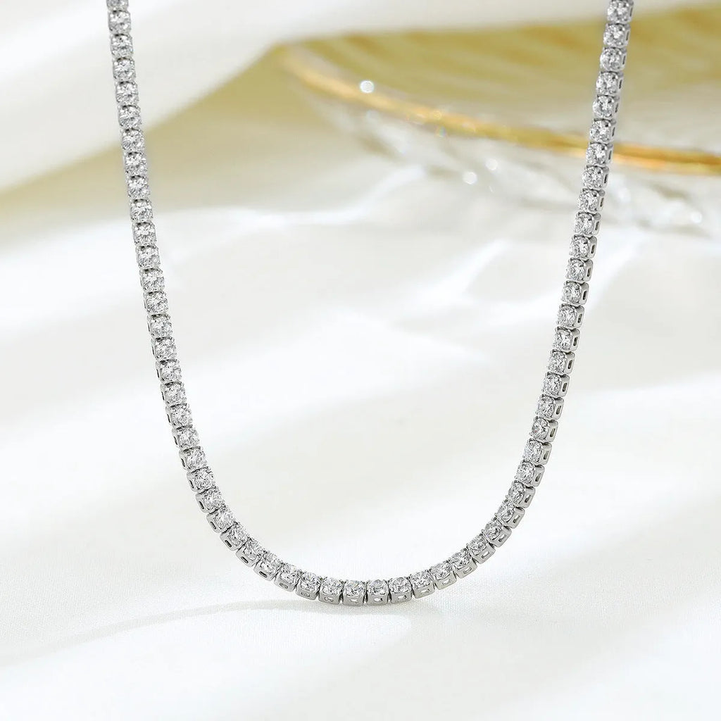 Women's sterling silver necklace with round pendant, diamond treatment finish