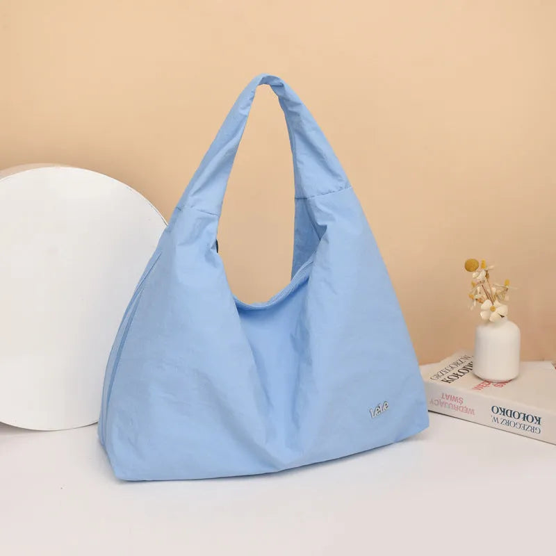Heart-shaped nylon underarm bag with detachable shoulder strap in four colour options