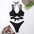 Women's solid colour strapless bikini swimsuit in black, blue, red, rose red, or white.