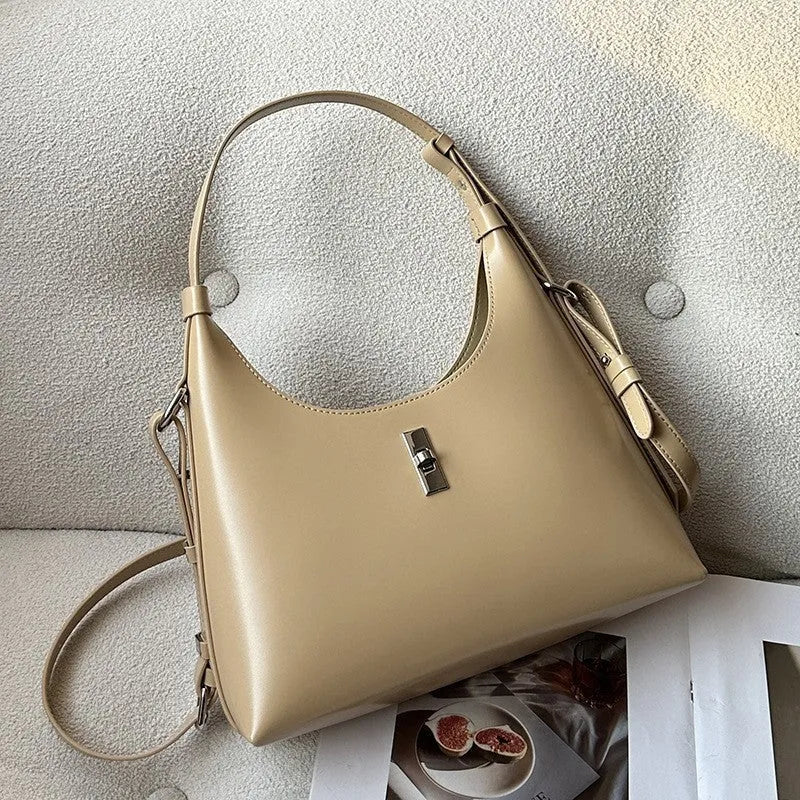 Genuine leather dumpling-shaped crossbody bag with multiple compartments in apricot colour