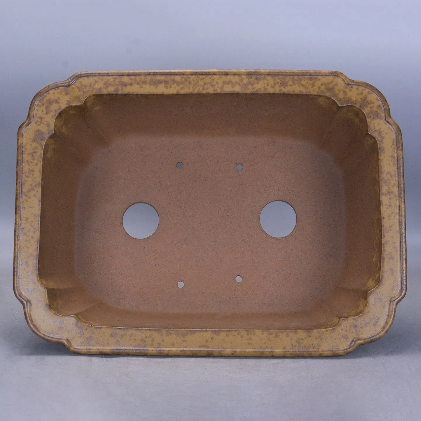 Purple sand rectangular segment mud flowerpot with hand-changed texture and double-pumping angle design.