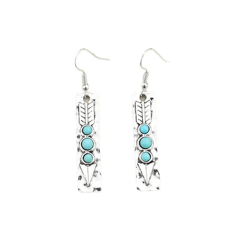 Silver geometric earrings with long strip design and turquoise inlay details