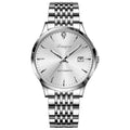 Men's stainless steel automatic mechanical watch with simple dial on wrist.