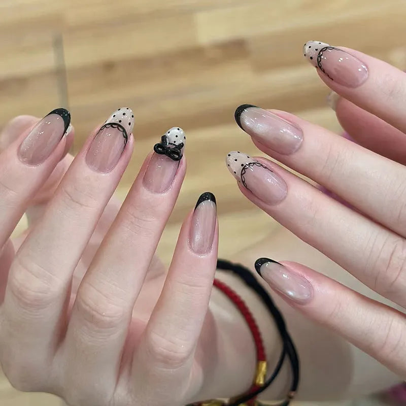 Set of colourful press-on false nails for girls with adhesive tabs on a white background.