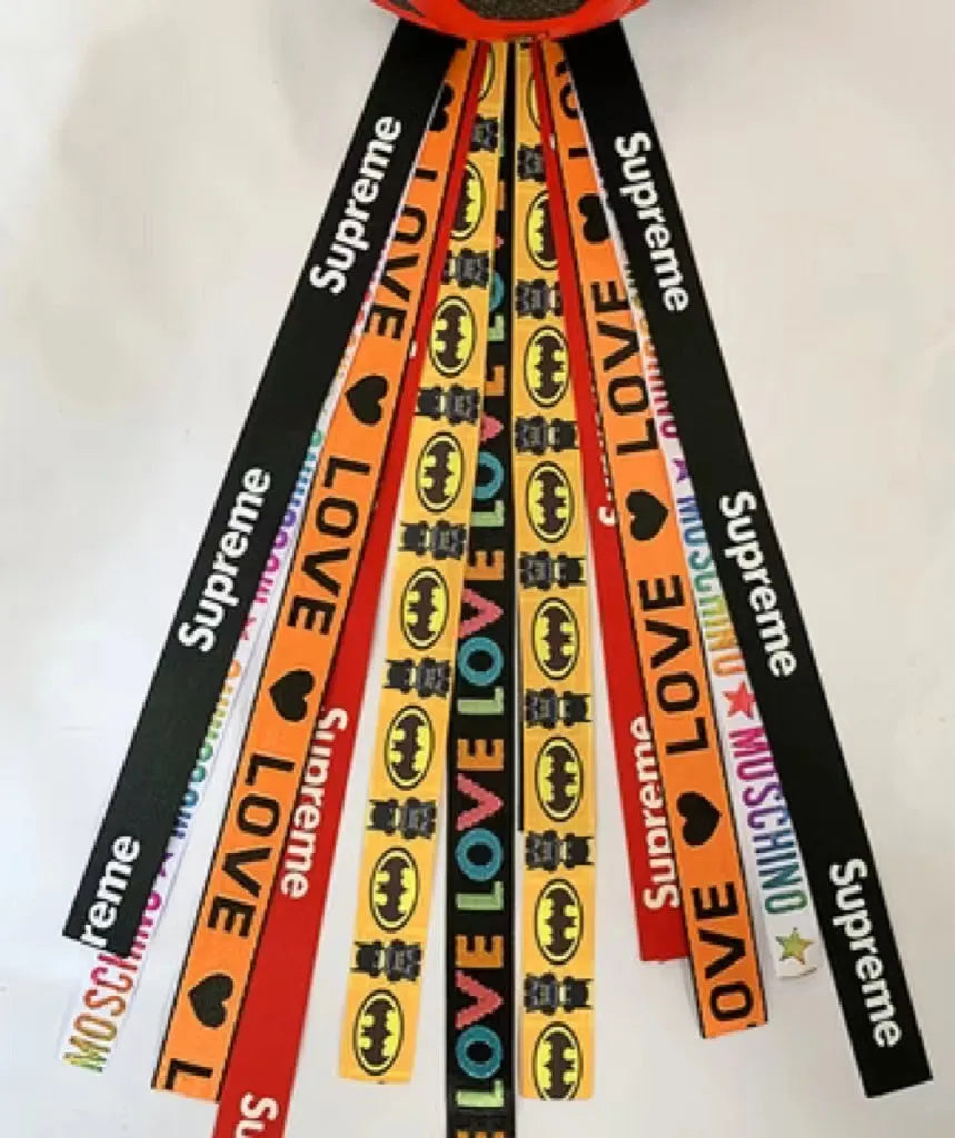 Children's decorative helmet streamer ribbon in multiple colours for roller skating and skiing safety gear.
