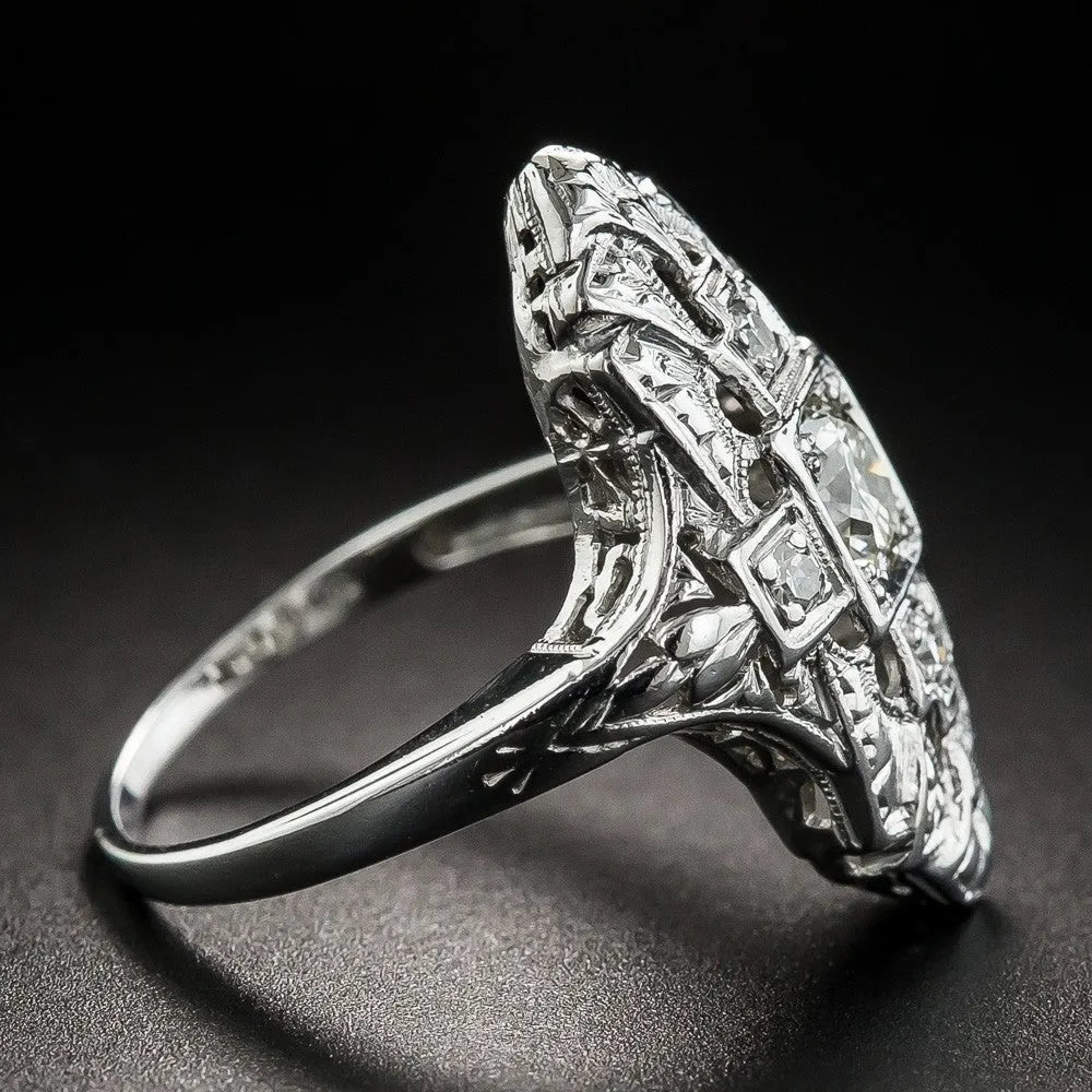 Copper electroplated silver ring with hollow cutout geometry design and diamond-studded details