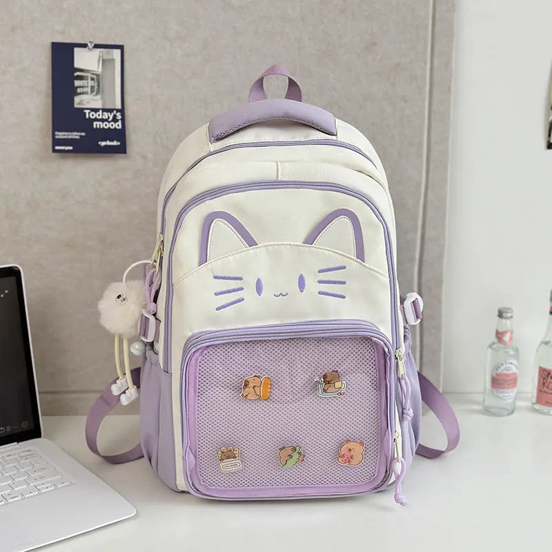 Korean cartoon animation style backpack in two sizes with curved shoulder straps.
