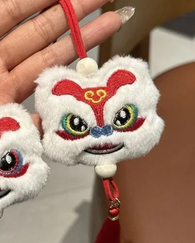 Blue and yellow Chinese style plush lion keychain ornament with star stone decorative elements