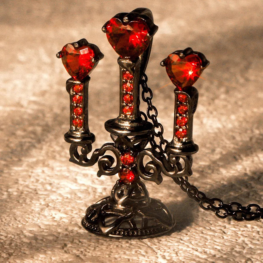 Women's retro gothic necklace with hollow candlestick pendant and cross chain in antique finish.