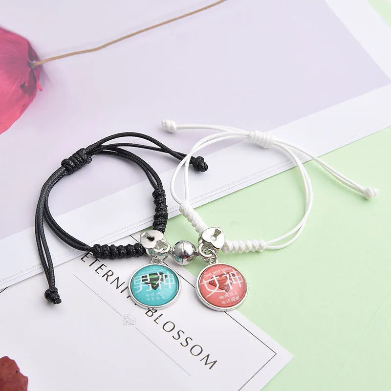 Alloy couple bracelets with magnet closure showing various design options including crown, clover, and text patterns
