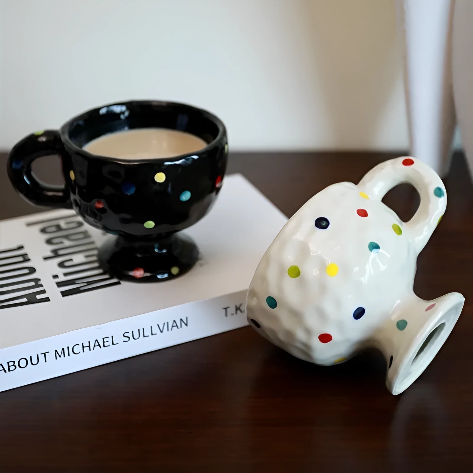 Hand-pinched irregular ceramic mug in solid colour with modern simple style, shown from side angle