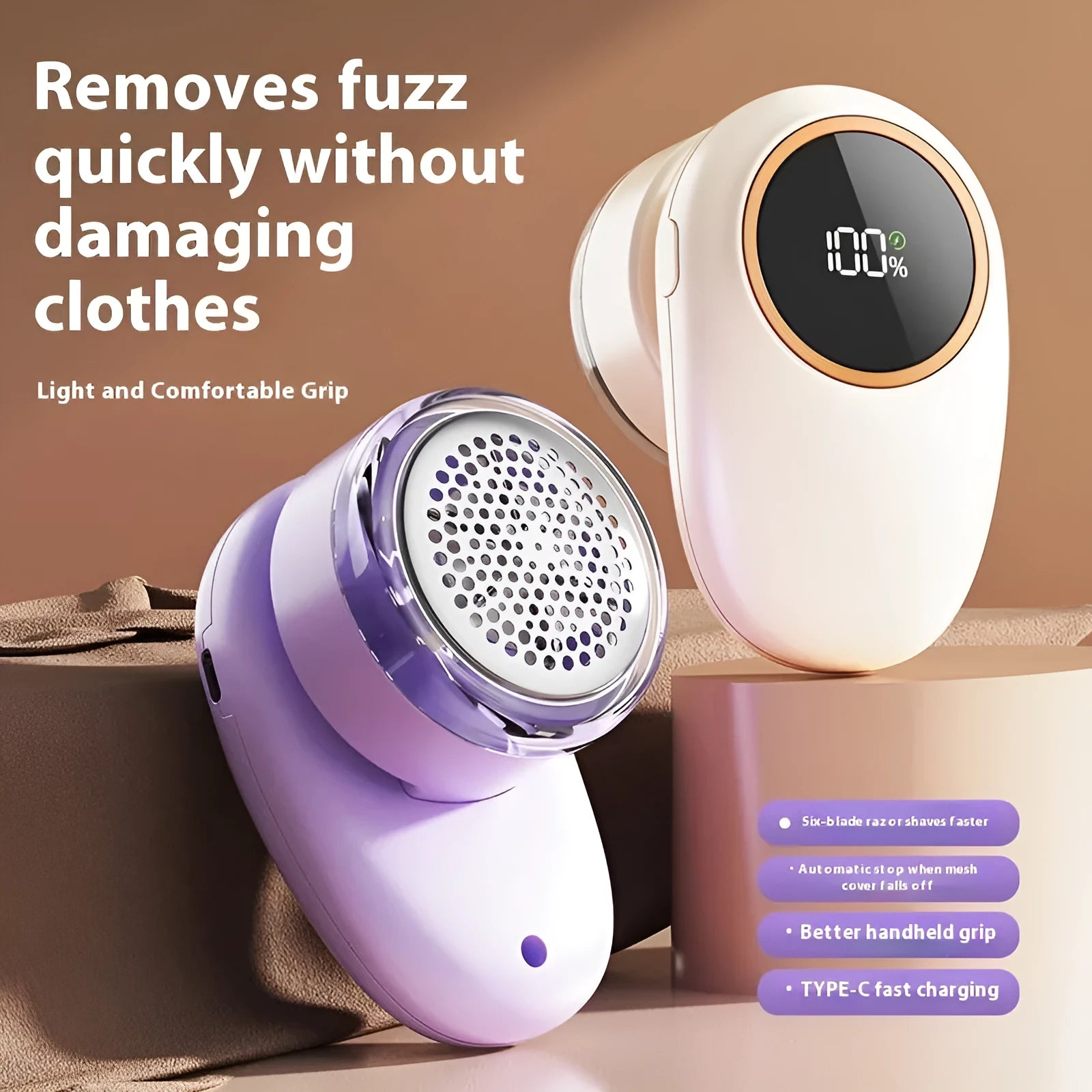 Beige and purple digital fur ball trimmer lint rollers with removable cutter heads on a table.
