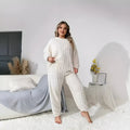 Women's creamy white polyester two-piece set with crew neck top and matching trousers in Japanese Korean casual style