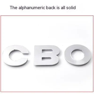 Close-up of a 3D metal zinc alloy letter 'A' car bumper sticker in silver finish.
