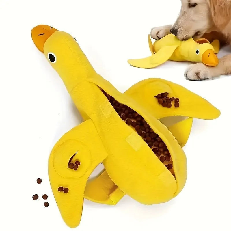 Yellow plush duck dog toy with treat compartments and squeaker for training