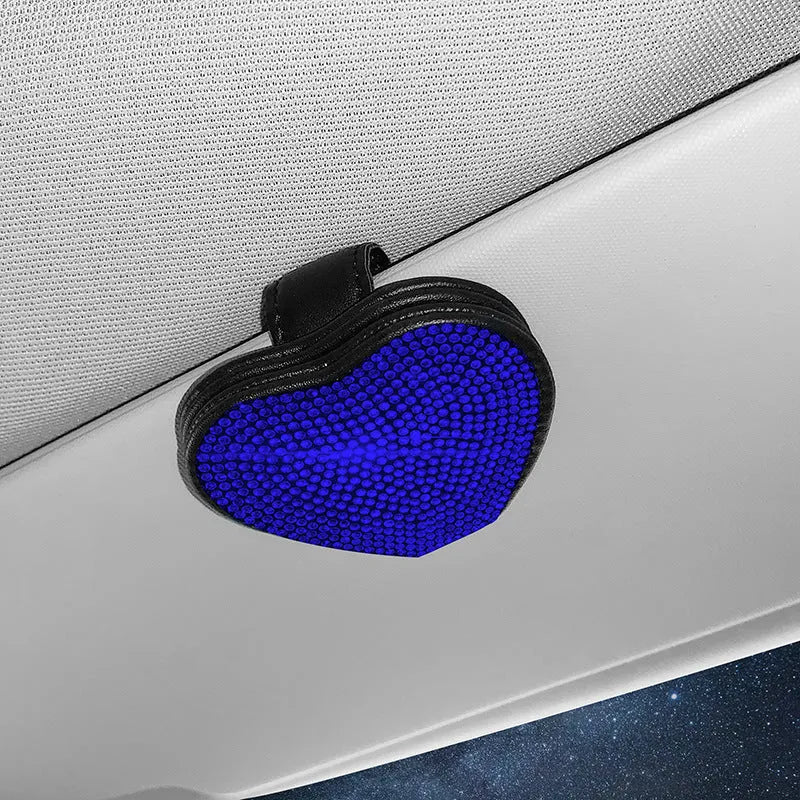 Black PU leather magnetic car sun visor clip holding sunglasses with a slot for tickets.
