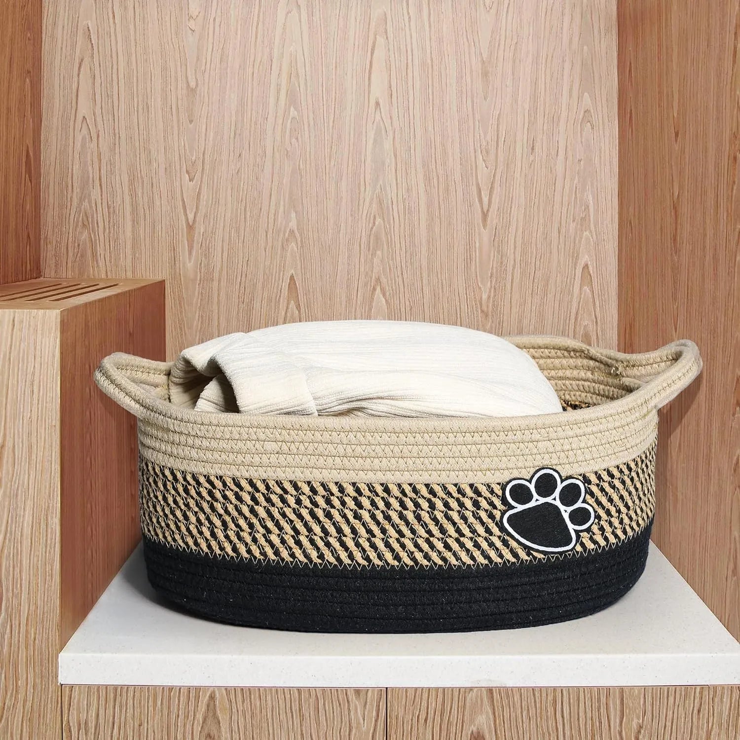 Small light beige woven cotton storage basket with wooden handle 34x26x15cm