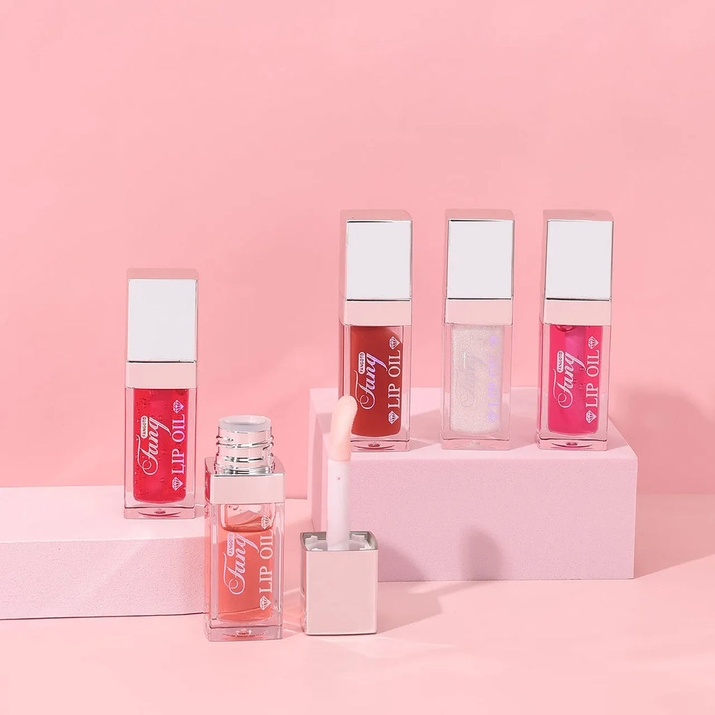 Mint flavour lip gloss stick in twist-up tube showing sheer glossy finish on lips