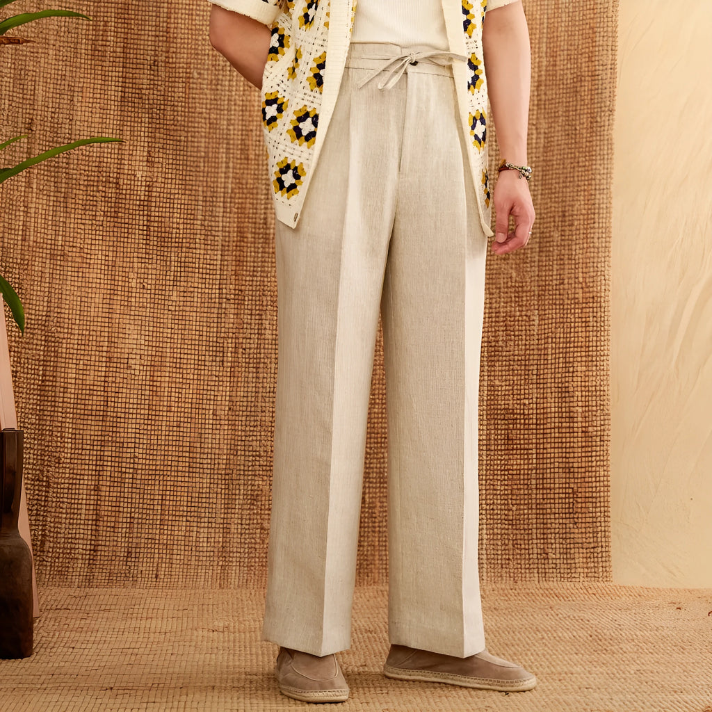 Women's linen high-waist trousers with elasticated waistband in navy blue, white, and greige colours