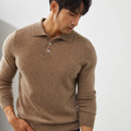 Man wearing a sapphire blue cashmere short sleeve pullover sweater with a polo collar.